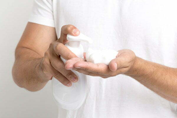 close-up-man-hand-spraying-shaving-foam