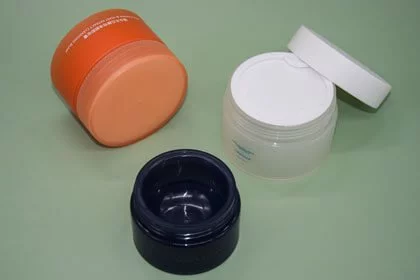 orange and black 4 oz cosmetic jars