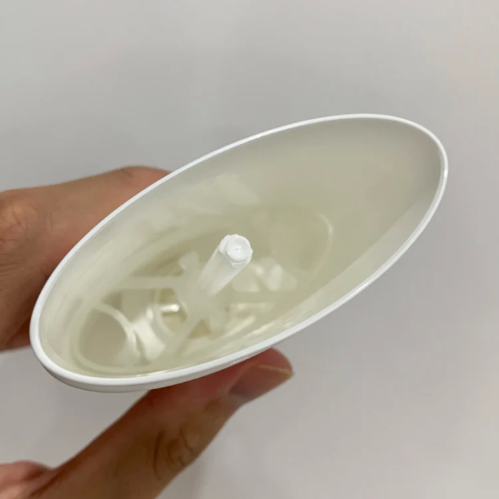 inside of empty deodorant roller bottle