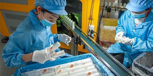 QC inspectors checking on a production line - 1