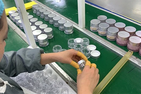 assembly and finishing of cosmetic cream jar - 111
